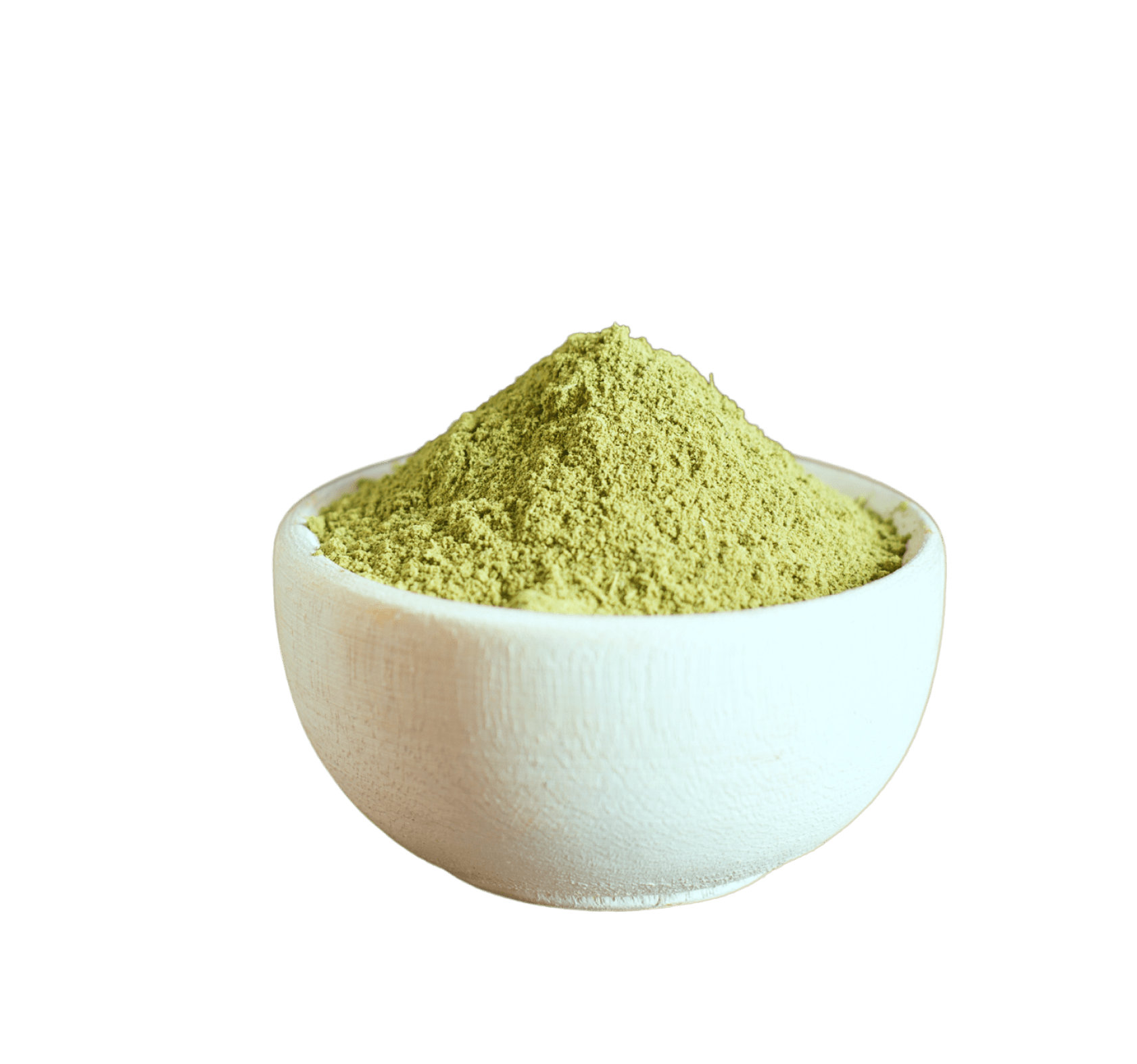 a white bowl with a green substance